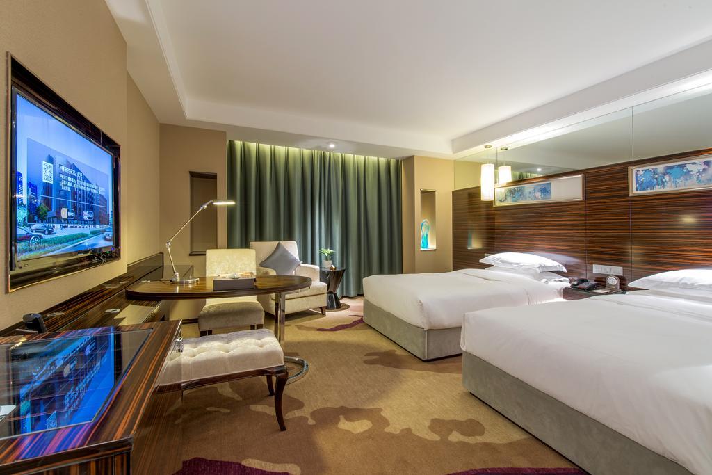 Longda Hotel Changchun Quarto foto