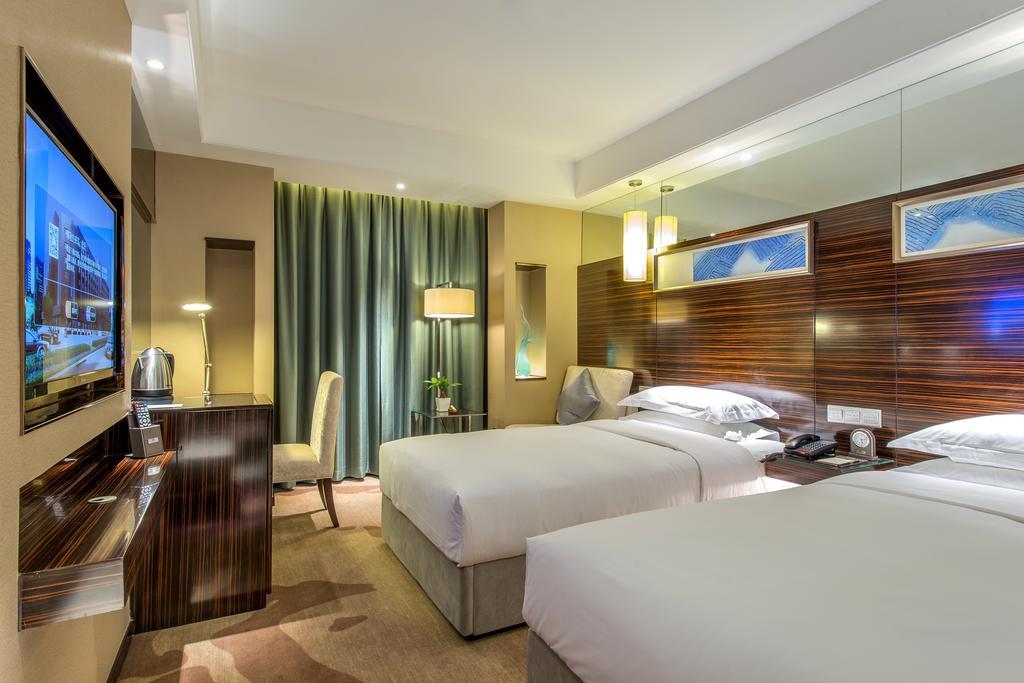 Longda Hotel Changchun Quarto foto
